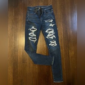 Women’s never worn American Eagle dark blue jeans size 2